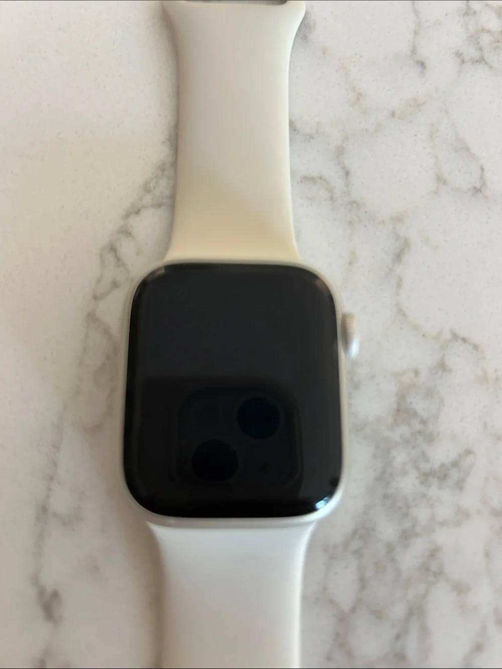 Apple Watch with White Silicone Band and Silver Case